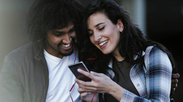 istock Beautiful young couple having fun outdoors on a lovely day 1143291756