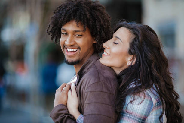 istock Beautiful young couple having fun outdoors on a lovely day 1143291827
