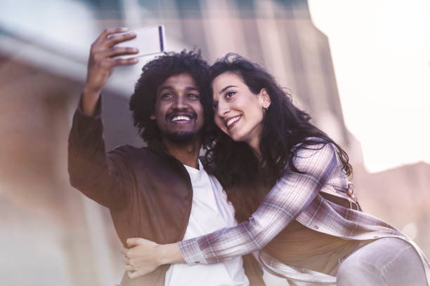 istock Beautiful young couple having fun outdoors on a lovely day 1143291942