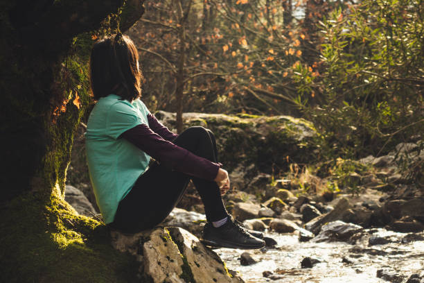 istock Young woman enjoying outdoor, looking view 1143291952