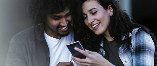 istock Beautiful young couple having fun outdoors on a lovely day 1143292522