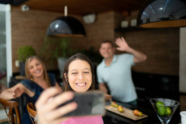 istock Woman taking a selfie with her parents 1143292693