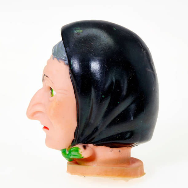 istock Finger punch puppet, grandmother with black headscarf, side view 1143297387