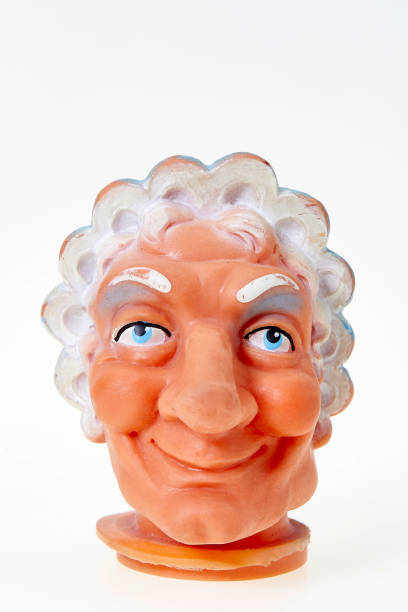istock Vintage finger punch puppet, smiling grandmother, front view 1143299325
