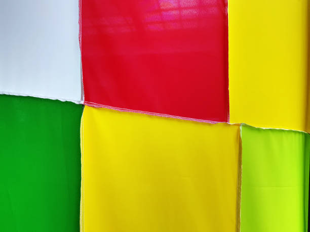 istock Full Frame Background of Vibrant Colorful Stitched Clothes 1143299547