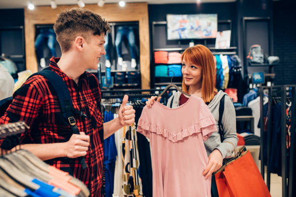 istock Happy couple buying clothes 1143300454