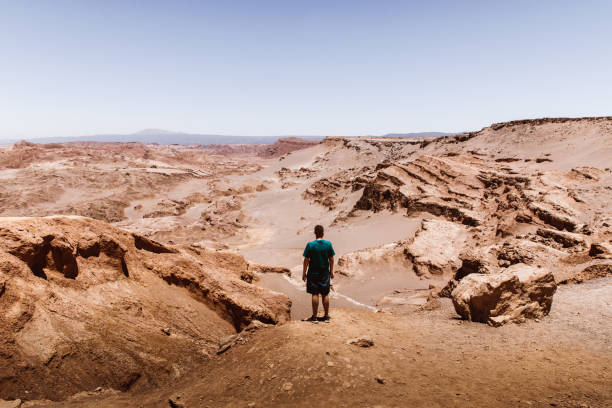 istock Man at beautiful canyon in Atacama desert 1143300481