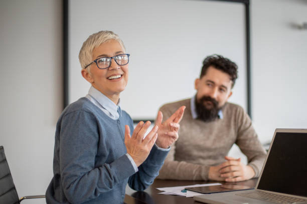 istock Multi-ethnic colleagues are shaking hands in a modern office 1143302626