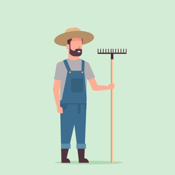 gärtner hält rake landmann arbeitet im gartenbau öko-bauernkonzept in voller länge - farmer stock-grafiken, -clipart, -cartoons und -symbole
