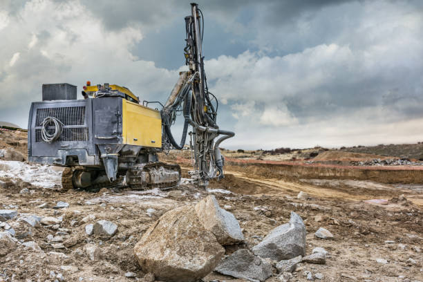 istock Rock and stone drilling in a building site 1143305364