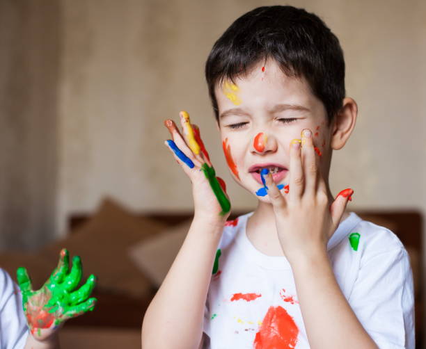 istock Face, painted, hands, white t-shirt 1143306430