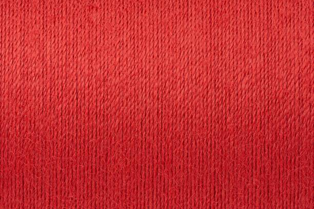 makro-bild der roten fadentextur hintergrund - wool thread textile textured stock-fotos und bilder