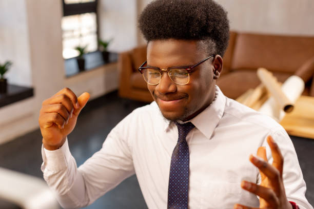 istock Nice smart young man showing his emotions 1143308047