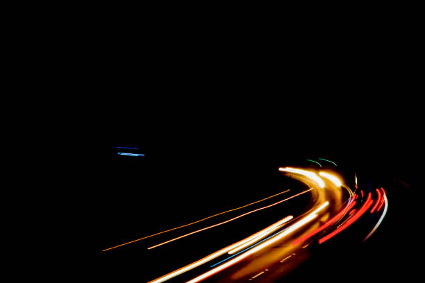 istock lights of cars with night 1143308397