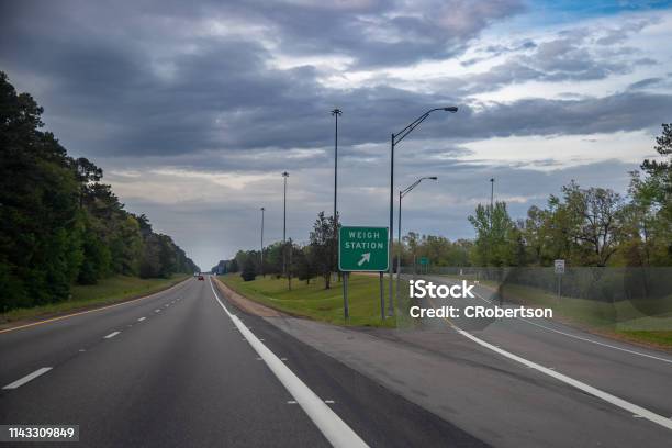 Weigh Station Exit For Freight Trucks On The Interstate Stock Photo - Download Image Now