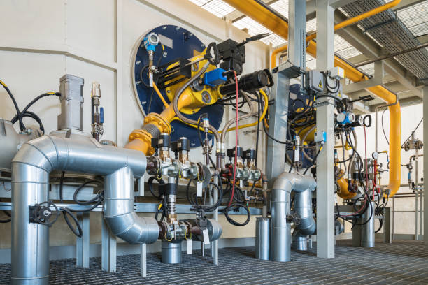 горелки котла высокой мощности - pipe power station valve water стоковые фото и изображения