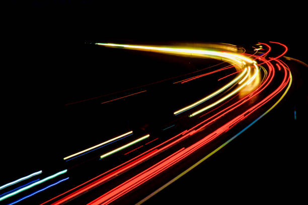istock lights of cars with night 1143310543