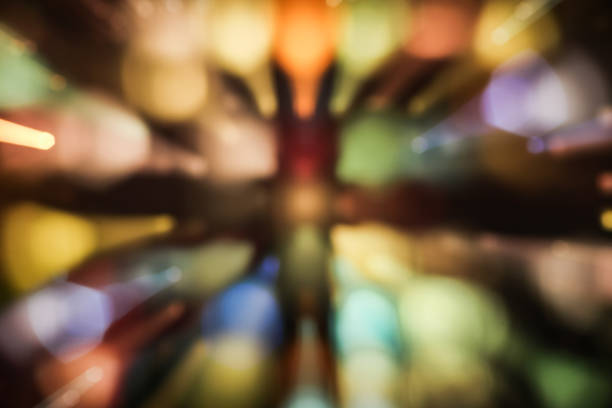 Colorfull blurred background with evening city lights zoom effect