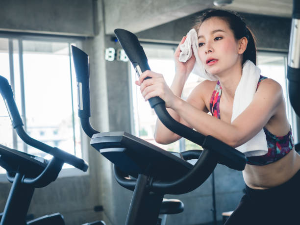 istock pretty girl exercise in gym 1143311435