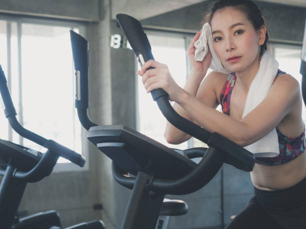 istock pretty girl exercise in gym 1143311437