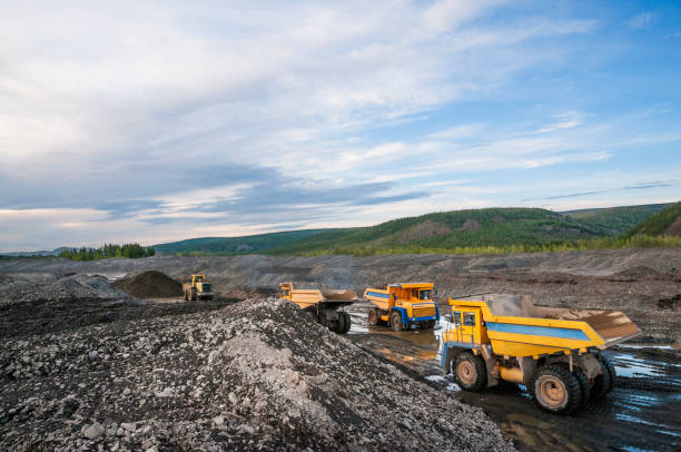 istock Bucket loader,  Mining truck, Earth work in Eastern Siberia ( Yakutia ) 1143312206