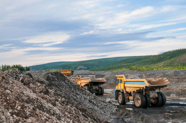 istock Bucket loader,  Mining truck, Earth work in Eastern Siberia ( Yakutia ) 1143312224