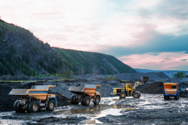 istock Bucket loader,  Mining truck, Earth work in Eastern Siberia ( Yakutia ) 1143312254