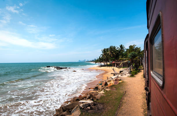 Coastal train in Sri Lanka Coastal train scenic view in Sri Lanka colombo train stock pictures, royalty-free photos & images
