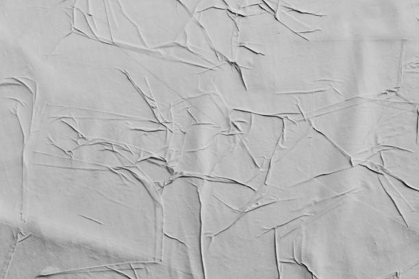 istock Crumpled creased posters grunge paper textures. 1143317634