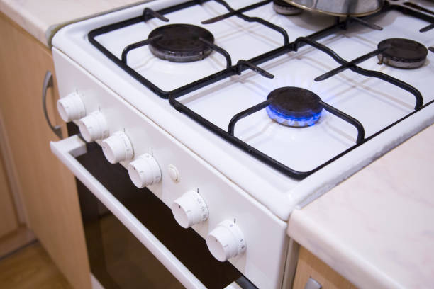 istock blue flames of gas stove 1143318433