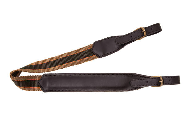 istock leather shoulder strap for a gun isolated on white background 1143319588