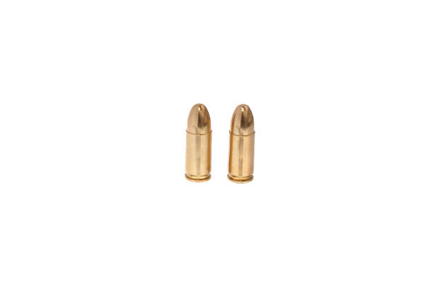 istock cartridges for a pistol isolated on white background 1143319998
