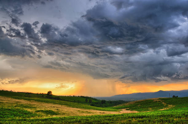istock Dramatic storm scene with rain at the horizon 1143320824