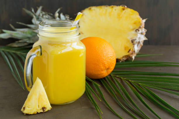 istock Pineapple juice in a jar with a straw. 1143321162