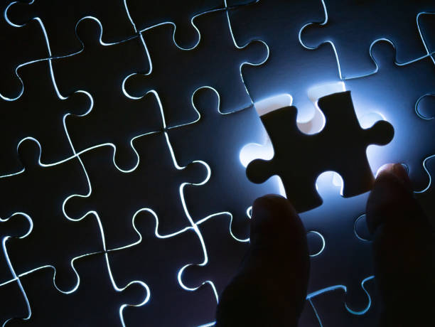 istock Missing Jigsaw puzzle piece with lighting, Business concept for completing the finishing puzzle piece. 1143321373