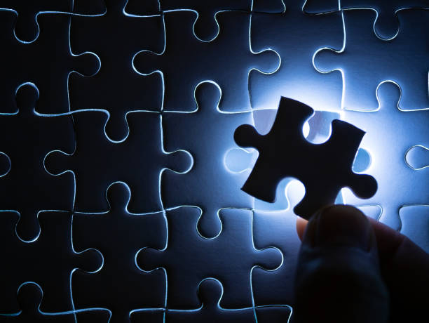 istock Missing Jigsaw puzzle piece with lighting, Business concept for completing the finishing puzzle piece. 1143321391