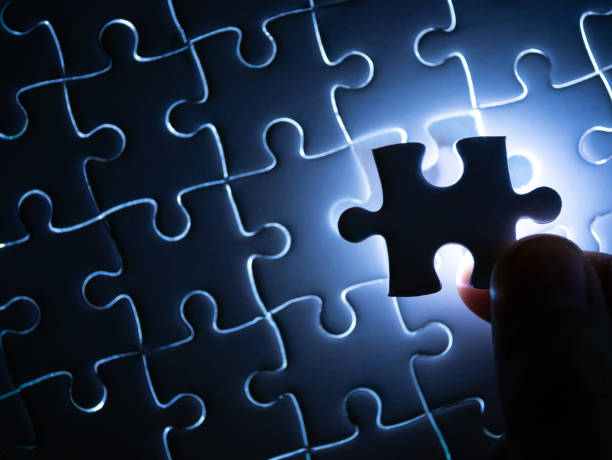 istock Missing Jigsaw puzzle piece with lighting, Business concept for completing the finishing puzzle piece. 1143321497