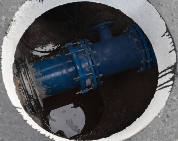 istock Open manhole in the concrete block 1143322932