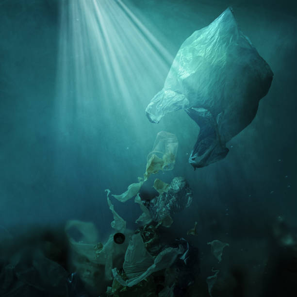 istock Floating plastic bag dispersing waste and polluting the ocean 1143323869