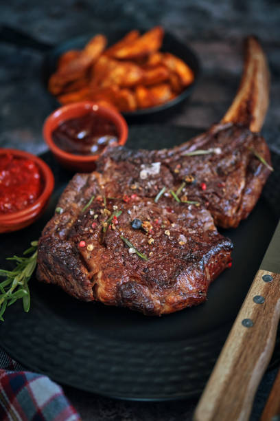 istock Tomahawk Steak with Country Potatoes 1143326159