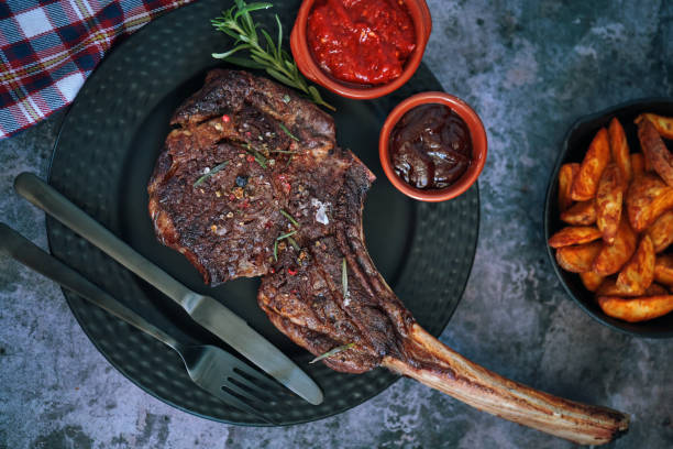istock Tomahawk Steak with Country Potatoes 1143326175