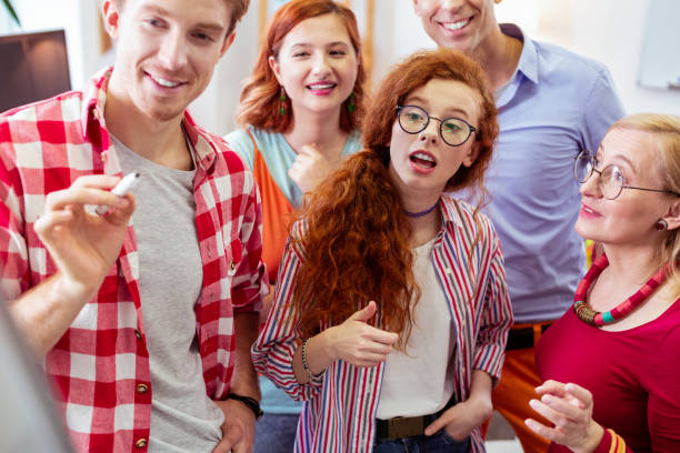 istock Pleasant red haired girl expressing her ideas 1143326391