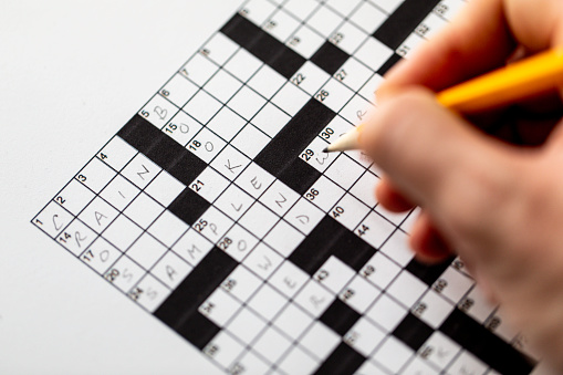 Black and white crossword puzzle that needs to be solved