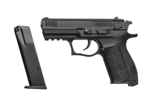 istock black gun pistol isolated on white background 1143327938