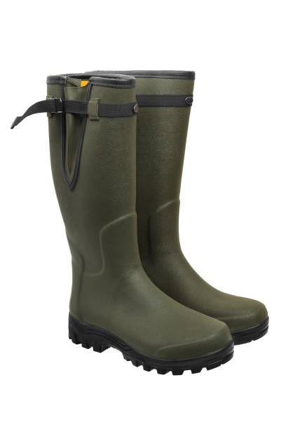 istock Green rubber boots isolated on white background 1143328065
