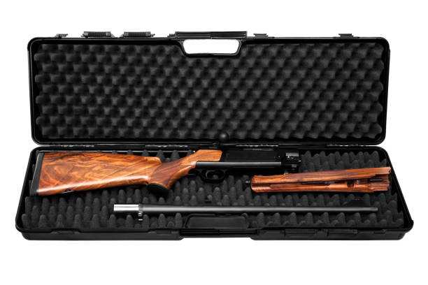 istock Disassembled hunting rifle in a plastic gun case isolated on white background. 1143328429