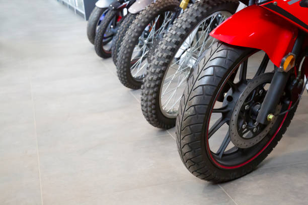 display of motorbike tires in a showroom