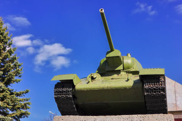 istock Soviet tank T-34 at war in the second world war on a blue sky background. 1143332613