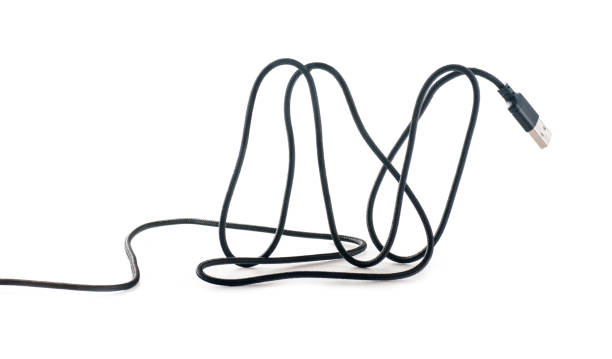 istock USB cable, cross to cross, close-up on white 1143332631
