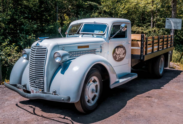 Classic oldtimer vintage truck on a country road.